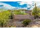 Community entrance sign at McDowell Mountain Ranch with landscaping at 16420 N Thompson Peak Pkwy # 2101, Scottsdale, AZ 85260
