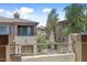 Exterior shot showcasing the community's architecture, landscaping, and mountain views in the distance at 16420 N Thompson Peak Pkwy # 2101, Scottsdale, AZ 85260