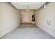 Clean and well-lit two-car garage with storage shelves at 16420 N Thompson Peak Pkwy # 2101, Scottsdale, AZ 85260