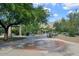 Community water feature with multiple fountains and desert landscaping, green space, mountain views at 16420 N Thompson Peak Pkwy # 2101, Scottsdale, AZ 85260
