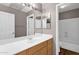 Bathroom with single sink vanity and shower/tub combo at 17204 E Kensington Pl, Fountain Hills, AZ 85268