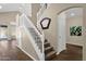 Entryway with a staircase, tile floors, and access to additional rooms at 17204 E Kensington Pl, Fountain Hills, AZ 85268