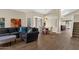 Open living space with a comfortable sectional sofa and adjacent dining area, perfect for entertaining at 17204 E Kensington Pl, Fountain Hills, AZ 85268