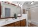 Bathroom with double vanity sinks, tub, and a neutral color palette at 1807 W Canary Way, Chandler, AZ 85286