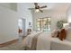 Spacious bedroom with tile floors, access to the outside and bathroom access at 1807 W Canary Way, Chandler, AZ 85286