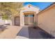 Inviting front entrance with a cozy porch, desert landscaping and well maintained doorway at 1807 W Canary Way, Chandler, AZ 85286