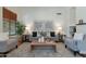Bright living room with comfortable seating, stylish decor, and ample natural light at 1807 W Canary Way, Chandler, AZ 85286