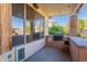 Covered outdoor patio and built in grill for your relaxation and entertainment needs at 1807 W Canary Way, Chandler, AZ 85286