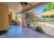 Large covered patio with built-in grill, ceiling fan and view of the backyard pool at 1807 W Canary Way, Chandler, AZ 85286