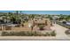 Aerial view of the property showing lush landscaping and a desert setting at 1953 E Presidio Rd, Phoenix, AZ 85022