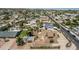 An aerial image displaying a home with a lush backyard, pool, and meticulously kept lawn at 1953 E Presidio Rd, Phoenix, AZ 85022