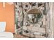 Unique and creative bathroom with mosaic tile designs and a round mirror adding artistic flair at 1953 E Presidio Rd, Phoenix, AZ 85022