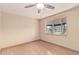 Bright bedroom with ceiling fan, bay window and wood-look floors at 1953 E Presidio Rd, Phoenix, AZ 85022