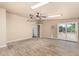 Spacious bonus room with tiled floors, recessed lighting and patio access at 1953 E Presidio Rd, Phoenix, AZ 85022