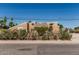 Charming exterior view with desert landscaping and mature trees at 1953 E Presidio Rd, Phoenix, AZ 85022