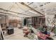 Unfinished garage or storage room with exposed ceiling and concrete floor at 1953 E Presidio Rd, Phoenix, AZ 85022