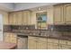 This home features a functional kitchen area with modern appliances and ample counter space at 1953 E Presidio Rd, Phoenix, AZ 85022