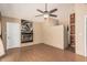 Spacious living room with wood floors and a stone fireplace adding warmth and character to the space at 1953 E Presidio Rd, Phoenix, AZ 85022