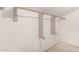 Walk-in closet with wooden rod and shelf provides clothing storage at 1953 E Presidio Rd, Phoenix, AZ 85022