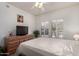 This bedroom is airy and bright with shuttered windows and neutral colors at 19700 N 76Th St # 1040, Scottsdale, AZ 85255