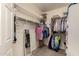 Walk-in closet with built-in shelving and ample storage space for clothes and accessories at 19700 N 76Th St # 1040, Scottsdale, AZ 85255
