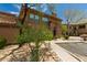 Charming two-story home with stucco exterior and stone accents, surrounded by mature landscaping at 19700 N 76Th St # 1040, Scottsdale, AZ 85255
