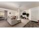 Spacious living room with comfortable seating, stylish decor, and a seamless flow to the balcony at 19700 N 76Th St # 1040, Scottsdale, AZ 85255