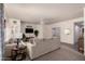 Bright living room with plush seating, elegant decor, and seamless transition to adjacent spaces at 19700 N 76Th St # 1040, Scottsdale, AZ 85255