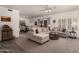 Open-concept living room featuring plush sofas, modern decor, and abundant natural light at 19700 N 76Th St # 1040, Scottsdale, AZ 85255