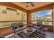 Relaxing covered patio with comfortable seating and views of the community at 19700 N 76Th St # 1040, Scottsdale, AZ 85255