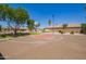 Community basketball court providing recreational opportunities for residents with surrounding green spaces and amenities at 1991 S Bahama Dr, Gilbert, AZ 85295