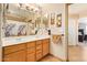 Bathroom featuring double sinks and a vanity with ample cabinet space at 1991 S Bahama Dr, Gilbert, AZ 85295