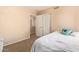 Bedroom featuring a sliding closet door and a bright window, creating a comfortable and inviting space at 1991 S Bahama Dr, Gilbert, AZ 85295