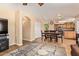 Open-concept dining area with table set and view into kitchen with stainless steel appliances at 1991 S Bahama Dr, Gilbert, AZ 85295