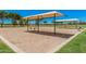 Fun swing set area offers a great place for to play and socialize within the community at 1991 S Bahama Dr, Gilbert, AZ 85295