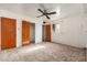 Standard bedroom featuring carpet and functional closet space, providing a practical and private area at 2002 W Whitton Ave, Phoenix, AZ 85015