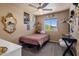 Cozy bedroom with posters, stylish accessories, natural light and a comfortable bed at 21813 N 40Th Way, Phoenix, AZ 85050
