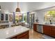 Bright eat-in kitchen featuring granite counters, tile floors, stainless appliances and stylish decor at 21813 N 40Th Way, Phoenix, AZ 85050