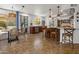 Spacious kitchen and dining area with tile flooring, stainless steel appliances, and a bright, airy feel at 21813 N 40Th Way, Phoenix, AZ 85050