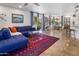 Open-concept living area with seamless transition to the kitchen, with natural light and stylish decor at 21813 N 40Th Way, Phoenix, AZ 85050