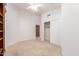 Bright room with carpet flooring, a ceiling fan, and a closet with sliding doors at 2230 E Whitten St, Chandler, AZ 85225