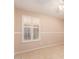 Neutral bedroom with carpet flooring, a ceiling fan, and window with shutter at 2230 E Whitten St, Chandler, AZ 85225