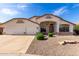 Charming single-story home with a well-manicured gravel yard and a spacious three-car garage at 2230 E Whitten St, Chandler, AZ 85225
