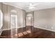 The primary bedroom boasts hardwood floors with views into the en suite bathroom at 2230 E Whitten St, Chandler, AZ 85225