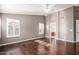 The main bedroom includes hardwood floors, ceiling fan, and natural light at 2230 E Whitten St, Chandler, AZ 85225