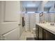 Cozy bathroom featuring dark wood cabinets and tile flooring at 23781 W Mohave St, Buckeye, AZ 85326
