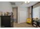 Cozy bedroom features a dresser with decorations, closet and window with natural light at 23781 W Mohave St, Buckeye, AZ 85326