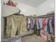 Inside the closet with hanging racks and shelving at 23781 W Mohave St, Buckeye, AZ 85326