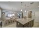 Bright open kitchen and dining area with modern appliances and plenty of counter space at 23781 W Mohave St, Buckeye, AZ 85326