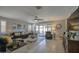 Inviting living room with large windows, comfortable sofa, and access to the backyard at 23781 W Mohave St, Buckeye, AZ 85326